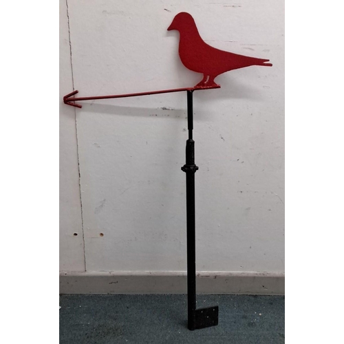 78 - Vintage metal weather vane featuring a red bird silhouette on a black mounting rod, from the mid-20t... 