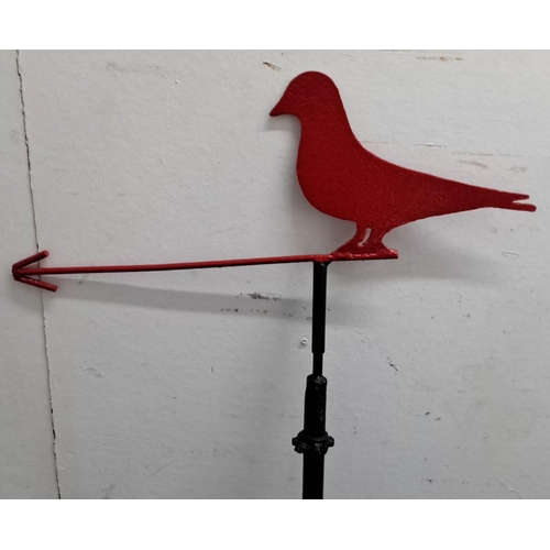 78 - Vintage metal weather vane featuring a red bird silhouette on a black mounting rod, from the mid-20t... 