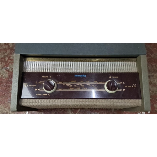 82 - Murphy vintage radio with a tuner and volume control. Features stations panel and fine weld mesh gri... 