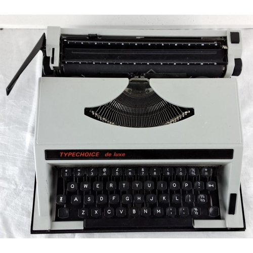 87 - Typechoice de Luxe typewriter, featuring a classic QWERTY keyboard layout.