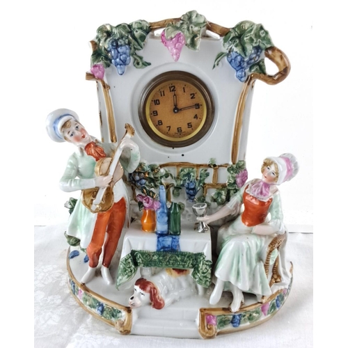 88 - Hand-painted porcelain clock adorned with vibrant floral and grapevine details and a motif of a roma... 