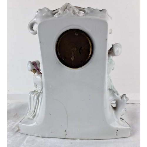 88 - Hand-painted porcelain clock adorned with vibrant floral and grapevine details and a motif of a roma... 