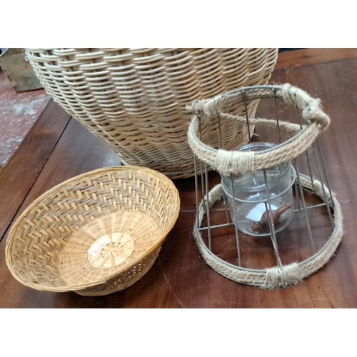 575 - Large lidded linen basket, woven bowl, and rustic wire-frame lantern with glass insert and jute acce... 