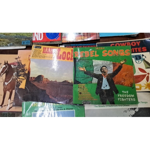 579 - Vintage vinyl records, featuring artists such as Mary Larkin, Gene Autry, and The Capitol Showband. ... 