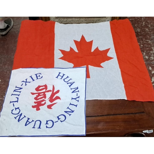 583 - Set of assorted flags including a Canadian flag and a flag with Chinese characters. Quantity unknown... 