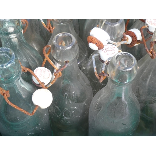 10 - A large collection of vintage glass bottles to include Robertson, Dundee.