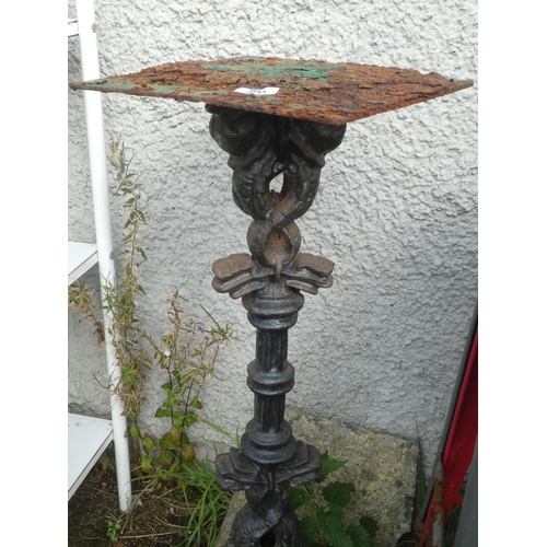 20 - A stunning antique cast iron table base with Dolphin design.