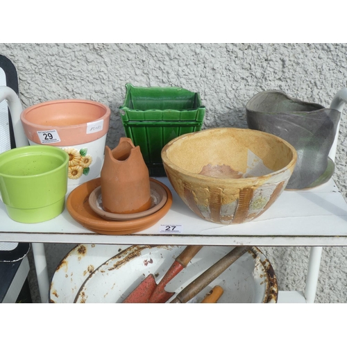 29 - A vintage enamel basin and an assortment of flower pots.