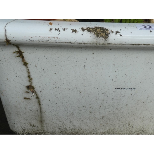 33 - A large vintage ceramic Twyford's Belfast sink with plant (a/f).