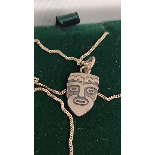 Vintage 830 silver pendant necklace featuring a tribal face design, housed in an original Kennedy's Jewellers box from Ballyclare and Ballymena.