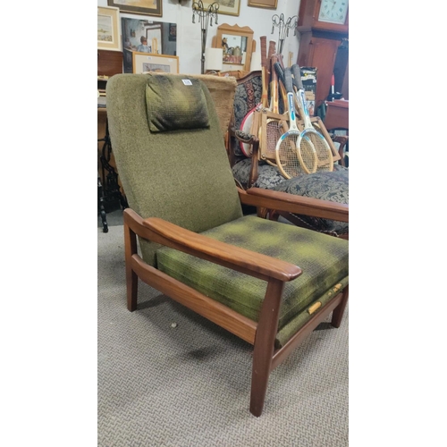 536 - Pair of Mid-Century Modern chairs, to include rocker & armchair, with original green upholstery and ... 