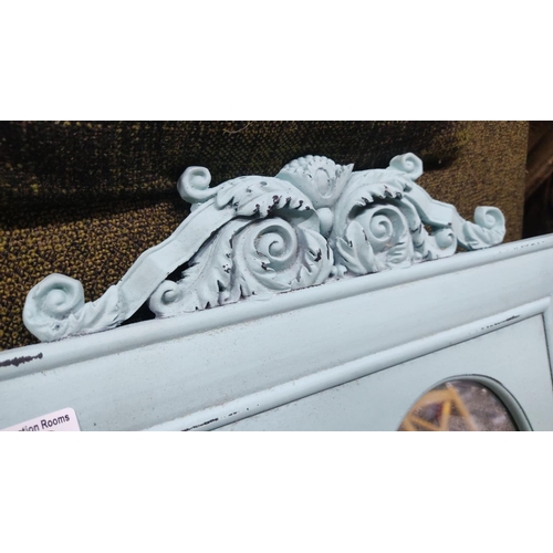 538 - Vintage light blue wooden mirror features ornate, carved detailing and a heart-shaped frame. It has ... 