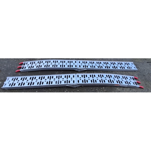 21 - Set of two foldable aluminum loading ramps with red plastic tips.