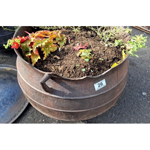 26 - Two cast iron cauldrons with handles and lid (a/f).