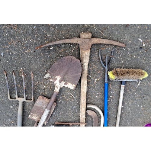 34 - Mixed lot of garden tools, including shovels, rakes, pruners, and shears. Includes Wolf-Garten TeleC... 