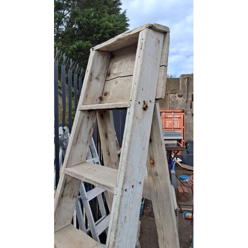 43 - Vintage wooden step ladder with sturdy metal supports.