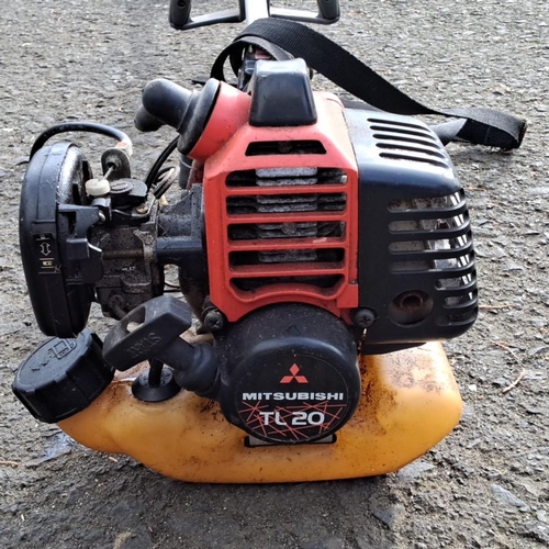 49 - Mitsubishi TL20 petrol-powered strimmer with shoulder strap, featuring a robust engine for efficient... 