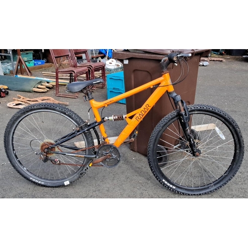 71 - Apollo Radar mountain bike features an orange frame with Shimano equipped gears and Kenda tyres (a/f... 