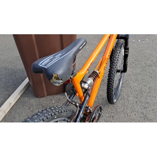 71 - Apollo Radar mountain bike features an orange frame with Shimano equipped gears and Kenda tyres (a/f... 