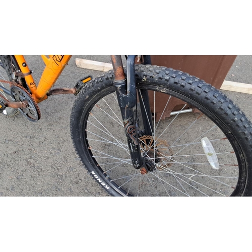 71 - Apollo Radar mountain bike features an orange frame with Shimano equipped gears and Kenda tyres (a/f... 