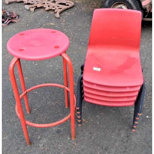 73 - Set of five red child's stacking chairs with black frames and one red metal stool.