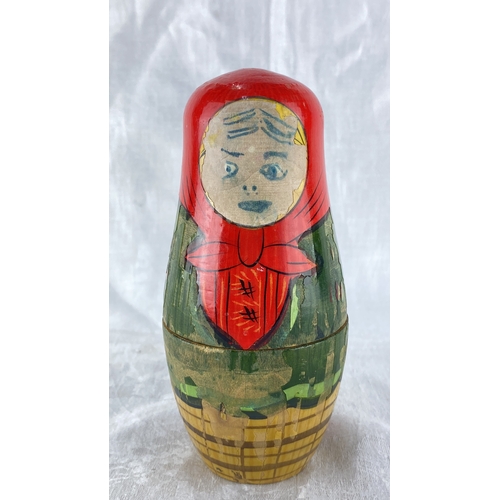 104 - Set of 4 traditional Russian matryoshka nesting dolls, wooden figures with vibrant red and green att... 