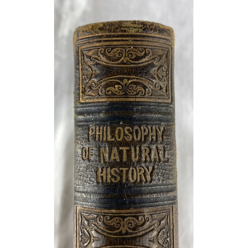 105 - Intricately embossed leather-bound book titled 