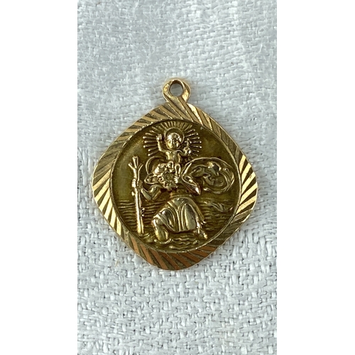 106 - 9k Gold Saint Christopher Medallion Pendant, hallmarked '375'. Features a detailed depiction of Sain... 