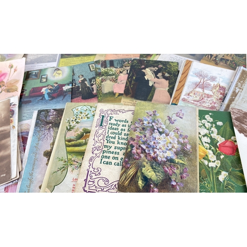 114 - Collection of vintage postcards featuring various themes including florals, landscapes, and sentimen... 