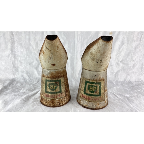 83 - Pair of vintage BP lubricants oil cans. Metal construction with BP branding and spouted tops. From t... 