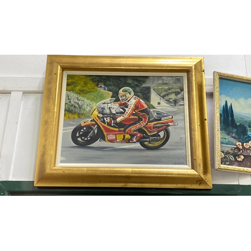 86 - Oil painting of a motorcyclist Tom Herron, signed by artist 'Penne' beneath the frame. Framed in a g... 