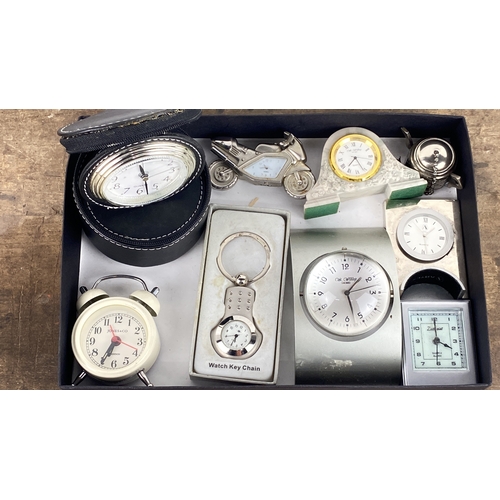 118 - Various decorative clocks, including pieces such as quartz travel clocks, vintage-style alarm clocks... 