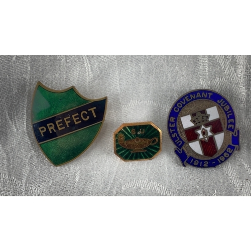 98 - Collection of three vintage enamel badges: Prefect shield in green and blue, NSU lamp insignia, and ... 