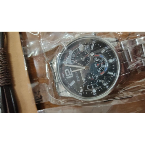 431 - Set of watches including two with leather straps and two with metal straps, and an Oruss brand watch... 