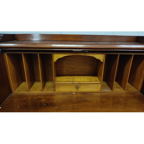 439 - Victorian mahogany drop-front secretary desk with fitted interior compartments and four drawers.