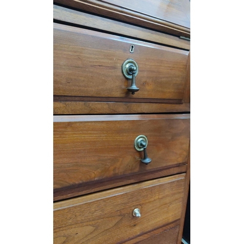 439 - Victorian mahogany drop-front secretary desk with fitted interior compartments and four drawers.