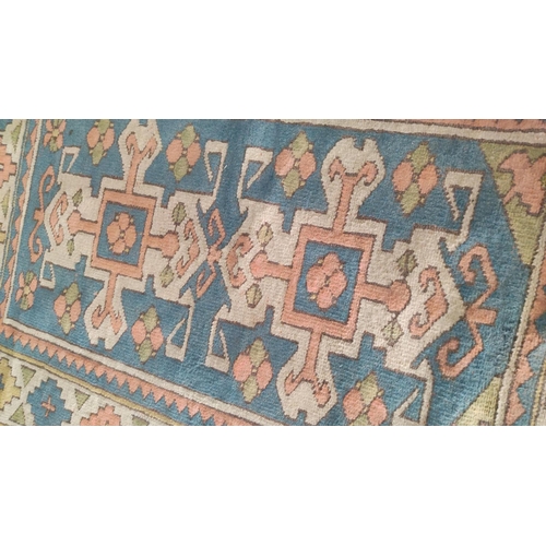 443 - Kilim rug features traditional geometric designs in a palette of blue, coral, green, and cream.