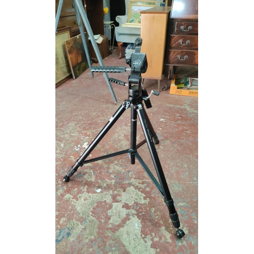 444 - Hama OmegaPro II tripod, model 4256, has adjustable legs and pan/tilt head.