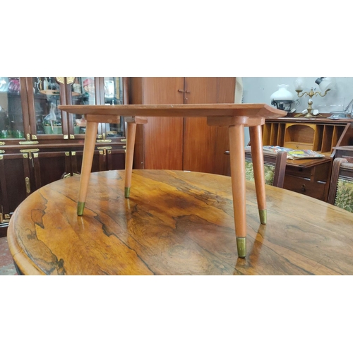 459 - Small Mid-Century Modern wooden side table with tapered legs and brass-capped feet.