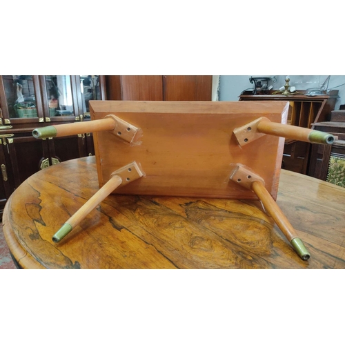 459 - Small Mid-Century Modern wooden side table with tapered legs and brass-capped feet.