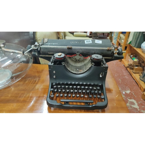 465 - Oliver typewriter, mid-20th century. Black finish with original keys and dual-color ribbon.