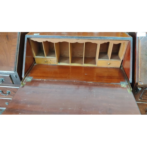 474 - Antique  mahogany bureau with fall front, three drawers, original brass handles, and internal compar... 