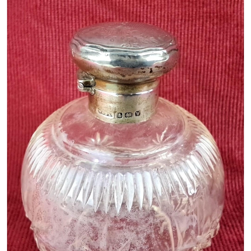 10 - Late Victorian cut glass perfume bottle with a sterling silver collar and cap, Birmingham 1921, mark... 