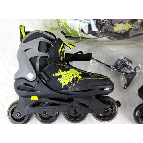 33 - A pair of children's rolling skates.