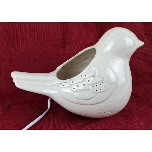 47 - Ceramic bird-shaped lamp with electrical cord and UK plug, featuring perforated decorative accents.