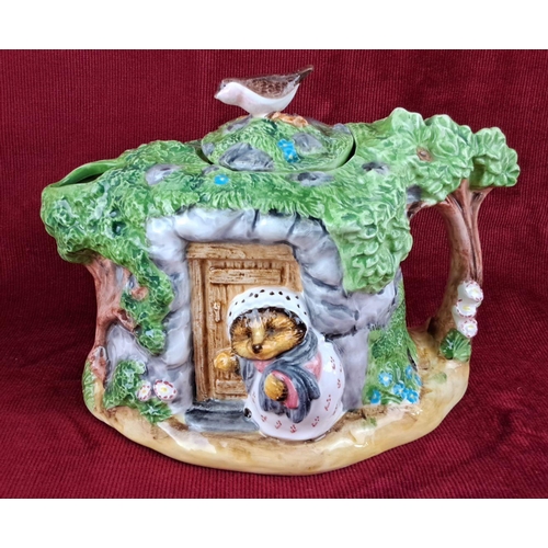 52 - Beatrix Potter Mrs. Tiggy-Winkle teapot with original box. Made of ceramic, featuring detailed woodl... 