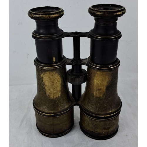 61 - Antique style brass and black enamel binoculars with adjusting knob, showing signs of patina and wea... 