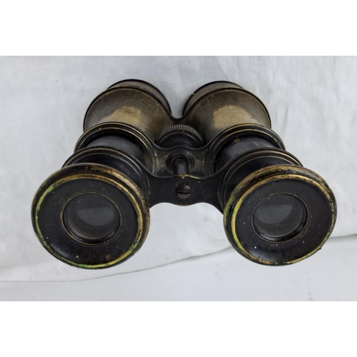 61 - Antique style brass and black enamel binoculars with adjusting knob, showing signs of patina and wea... 