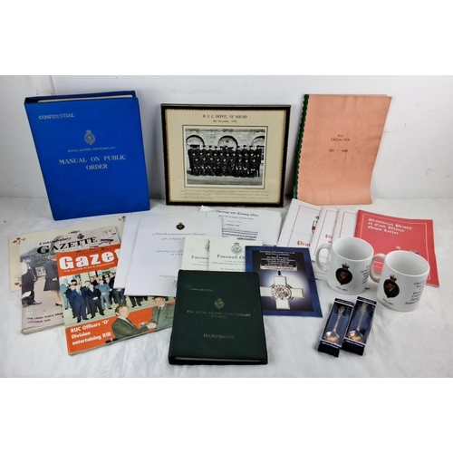 76 - Mixed lot of Royal Ulster Constabulary memorabilia, including manuals, photographs, magazines, cerem... 