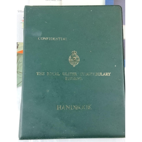 76 - Mixed lot of Royal Ulster Constabulary memorabilia, including manuals, photographs, magazines, cerem... 